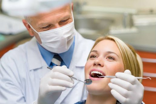 dentist-and-patient-posing-like-examination.jpg