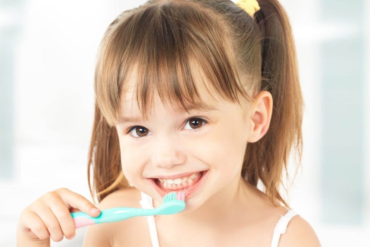 child-brushing-her-teeth-1200x801.jpg
